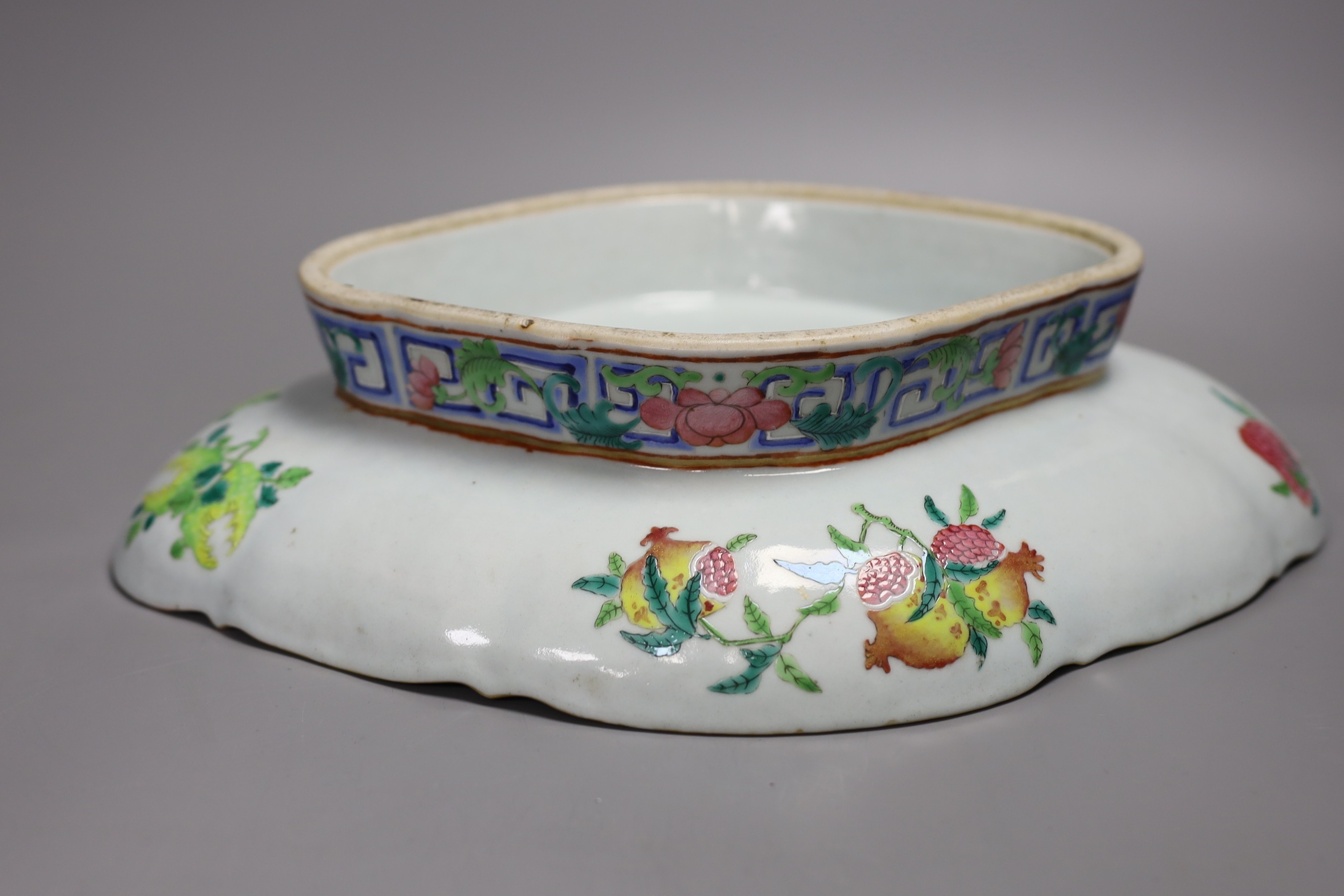 A Chinese Canton oval footed dish, 36cm wide, and a Japanese box with floral decoration and intertwining scroll hinge